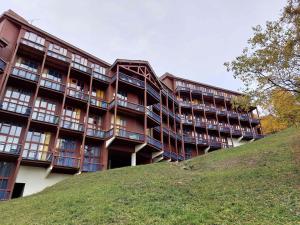 Résidence Aiguille Grive Bat I - Duplex pour 5 personnes à Arc 1800 dans le village de Charmettoger, skis aux pieds MAE-1768