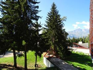 Résidence Belles Challes - Studio 4 personnes à Arc 1800 skis aux pieds et proche des commerces dans le village du Charvet MAE-1972