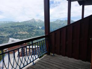 Résidence Vogel - Chaleureux duplex pour 4 personnes avec une très belle vue sur la vallée dans le village de Charmettoger à Arc 1800 MAE-2129