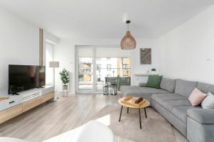 Apartament SeaVibe - basen, siłownia, sauna i garaż by Noclegi Renters