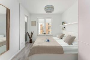 Rodzinny Apartament SeaVibe z Dostępem do Parkingu Sauny oraz Siłowni by Noclegi Renters