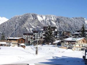 Résidence Les Alpages - Superbe appartement, avec piscine extérieure et tennis, au pied des pistes MAE-2374