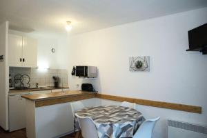 Résidence Les Carlines - Studio équipé pour 4 personnes vue pistes MAE-2304