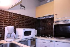 Résidence Le Belvedere - GRAND STUDIO 6 PERSONNES CENTRE STATION MAE-3854