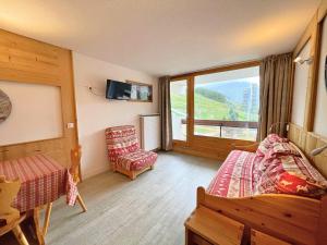 Résidence Chaviere - Ski aux pieds, appartement pour 5 personnes tout en bois au coeur des Ménuires MAE-4924