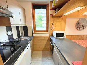 Résidence Chaviere - Ski aux pieds, appartement pour 5 personnes tout en bois au coeur des Ménuires MAE-4924