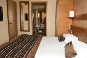 Résidence Les Terrasses Deos - Appartement confortable · Accès direct aux pistes · Piscine · Spa · WIFI gratuit et illimité MAE-6164