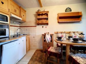 Résidence Boedette A - Appartement confortable · Départ et retour skis aux pieds · Balcon MAE-1004
