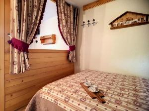 Résidence Boedette A - Appartement confortable · Départ et retour skis aux pieds · Balcon MAE-1004
