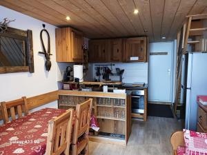 Résidence Aiguille Grive Bat Iii - superbe appartement 2 pièces 6 personnes en duplex, skis aux pieds, dans le village de Charmettoger à Arc 1800. MAE-7801