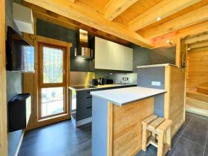 Résidence Campanules - Ski aux pieds, appartement pour 6 personnes tout en bois au coeur des Ménuires MAE-9071