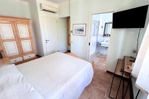 P079 - Porto Recanati, bilocale con corte in residence con piscina