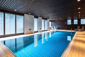 Rosels Mountain Lodge - Ferienwohnung mit Schwimmbad, Sauna & Bergblick - Oberaudorf Bayern