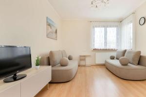 Cozy Apartment Jelitkowski Dwór in Gdansk with Parking by Noclegi Renters