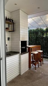 Casa em Riviera de São Lourenço Prática e Confortável, Reformada e Equipada!