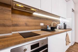 The Cozy Nest - Modern 1BR with Balcony