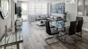 Great 2BR Condo-DIRECT BEACH ACCESS Pool, Gym and FREE Parking