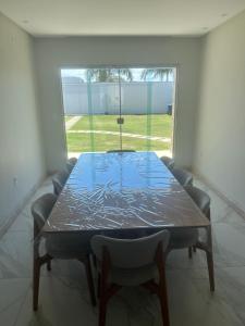 Casa com piscina, hidromassagem e vista para o mar