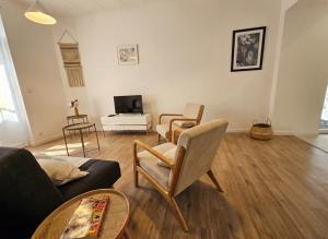 2 maisons réunies de plain-pied 6 chambres hypercentre et à 300 m de la plage Accueil humain