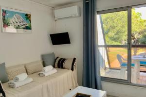 Le Petit Ponant Cozy Studio with Lagoon View & Swimming Pool!
