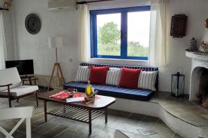 Beachfront cottage house in olive grove