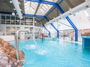 4 person holiday home on a holiday park in Hejls