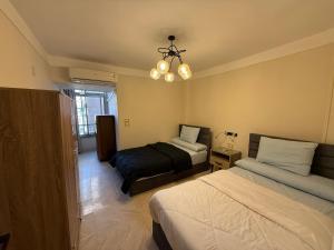 10 Min to Cairo Airport - Modern 2 BD Apartment - 3 Beds