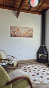 Chalé com vista para montanhas com banheira, lareira e piscina em Socorro - Refúgio Campestre - Canário