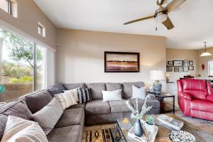 Dog-friendly, ground-floor condo with patio, desert views, pool, hot tub, & WD