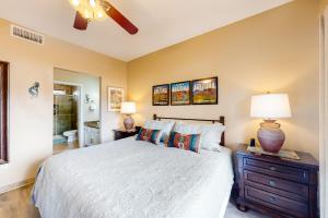 Dog-friendly, ground-floor condo with patio, desert views, pool, hot tub, & WD