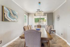 Exquisite home with firepit, game room, heated pool, pool spa, & putting green