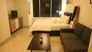 Apartemen Grand Kamala Lagoon by Cleo Room
