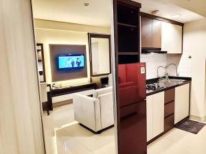 Apartemen Grand Kamala Lagoon by Molly Room