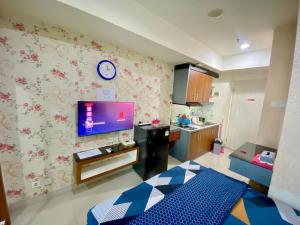 Apartemen Grand Kamala Lagoon by Fast Room
