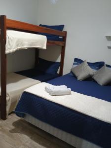 400 mt da Praia da Enseada Wi-fi Estacionamento gratuito cozinha completa