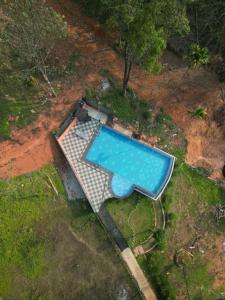 Kashmeeram Vythiri Wayanad Premium Pool Resort