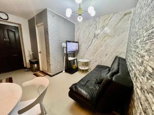 UNOS Place with Karaoke,Wifi,Netflix and Balcony