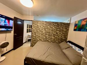 UNOS Place with Karaoke,Wifi,Netflix and Balcony