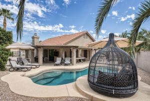 High-end home with private pool, enclosed yard, pizza oven & putting green