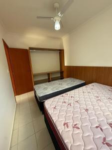 Apartamento novo em localização privilegiada na Praia Grande com ar condicionado e piscina