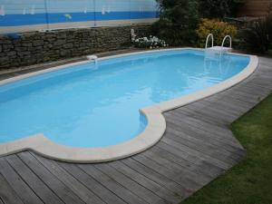 Traditional Cottage in Plomeur with Swimming Pool