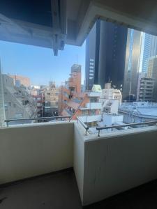 Walk to JR Shinjuku-Grand Écru II 603 - Balcony & Kitchen