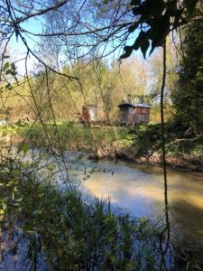 Otter Camp Private Riverside Glamping with Hot Tub