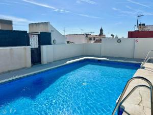 Heart of Malaga Rooftop Pool with Private Parking