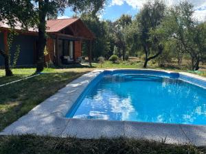 Casa con piscina La Miel