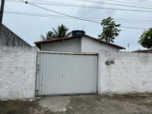 Casa Aconchegante com 2 quartos a 9 minutos de carro para as praias mais procuradas da região