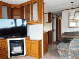 Mobile Home im Ferienpark mit Seezugang