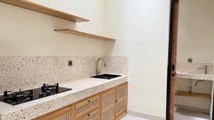 Modern 1BR Pool View Walk to Beach Central Legian