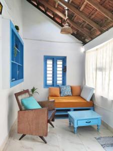 Blue Doors - Traditional Kerala Home