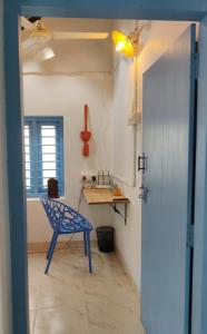 Blue Doors - Traditional Kerala Home